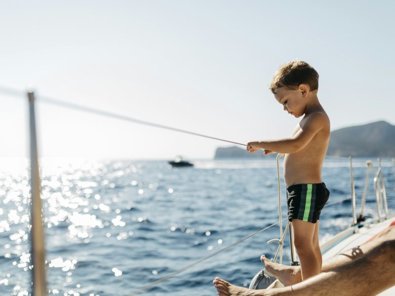 Little boy on a sailing boat